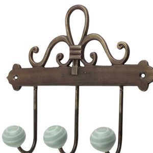 Colgador de pared Vintage hecho a mano, diseño de tira de Metal y cerámica decorativa, color verde y blanco, calidad superior, venta al por mayor en línea - Product Image 1