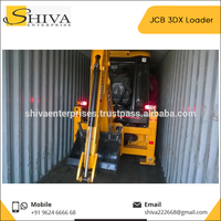 Chargeuse-pelleteuse JCB 3DX utilisée dans les travaux de construction