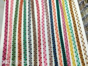 ริบบิ้นและลูกไม้ปักลายดอกไม้หลากสีสันและลวดลาย เหมาะสำหรับร้านขายริบบิ้น - Product Image 6