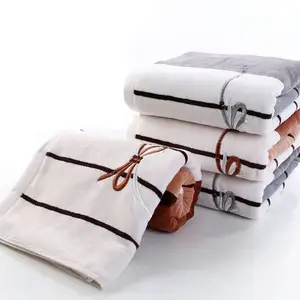 Juegos de toallas de baño de diseño personalizado de algodón suave decorativo de lujo a granel 100% para hoteles y hogar