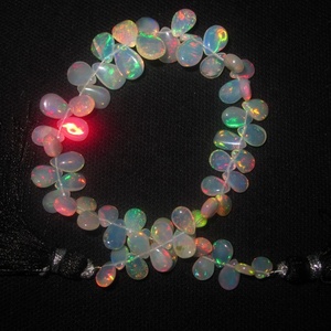 Ethiopian <b>Opal</b> Plain Almond Pear Shape Gemstone Beads Strands - Product Image 1