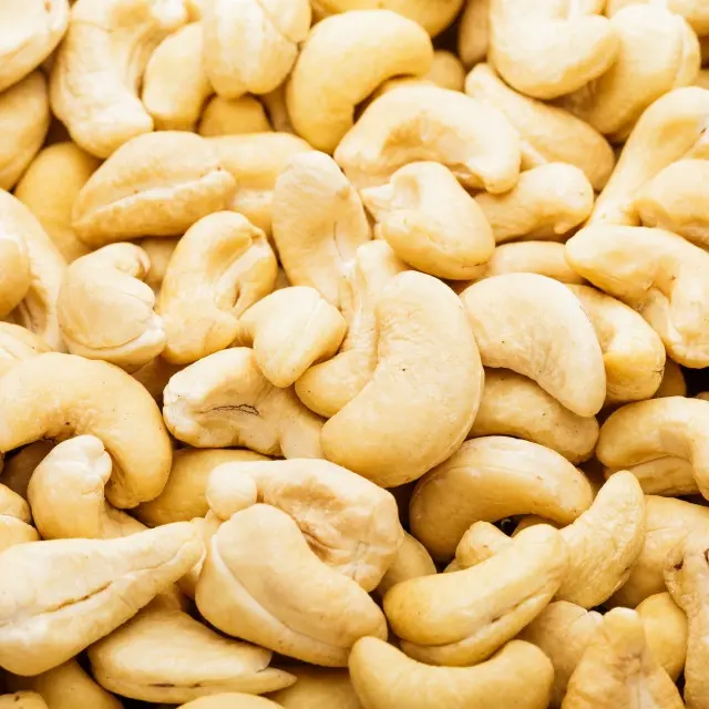 Produk Penjualan Terbaik Kacang Mete Tipe Pengolahan Mentah Ukuran Penuh Dibuat Di Vietnam dengan Kacang Mete Kualitas Tinggi