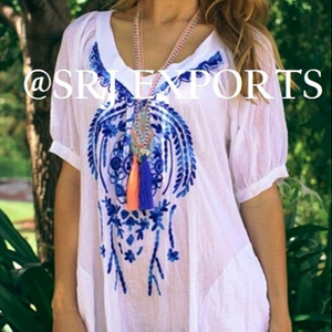 ชุดเดรสสั้นสีขาวสำหรับผู้ใหญ่ ปี 2026 แบบใหม่ล่าสุด พร้อมลายปักโซ่สีน้ำเงิน แขนสั้นทรงบอลลูน เหมาะสำหรับงานปาร์ตี้ริมชายหาดและงานกลางคืน - Product Image 2