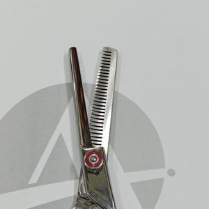 Ciseaux à effiler les cheveux en acier inoxydable 32 dents avec vis réglable et repose-doigts Ciseaux professionnels - Product Image 2