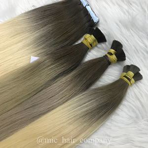 Paquete de pelo vietnamita virgen Remy al por mayor 100%, máquina de trama doble, textura de onda profunda, cutícula alineada, extensión humana a granel - Product Image 1