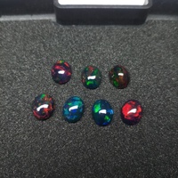 Opale noire d'Éthiopie naturelle de qualité supérieure Grade AAA, forme ovale 8x10 mm, cabochon 1,80 carat, pierre précieuse en vrac avec jeu de couleurs/effet de feu