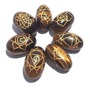 Juego de chakras de ojo de tigre curación Lingam Shape 7 chakra juego de piedras chakras Reiki juego de piedras preciosas cristal curativo natural al por mayor - Product Image 1