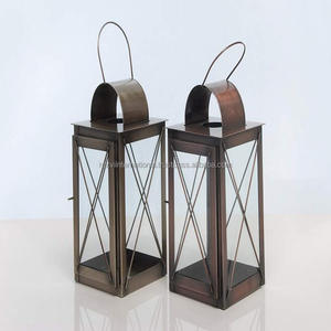 Lanternes à bougie en métal fini antique pour la décoration intérieure pour les occasions de Pâques - Product Image 1