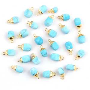 Vente en gros de fournitures de recherche howlite turquoise connecteur de culbutage or galvanoplastie tranchant pendentif breloques bricolage connecteur pour bijoux - Product Image 1