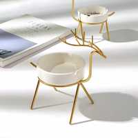 Porte-bougie en fer écologique et créatif avec finition dorée, design durable, style américain, à poser au sol pour la décoration de salon et de la maison