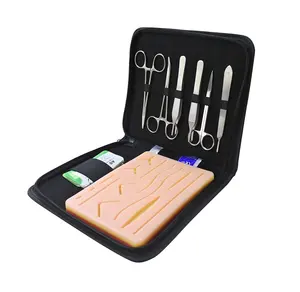 مجموعة أدوات للتدريب على خياطة الجروح لطلاب الطب مع أدوات طبية