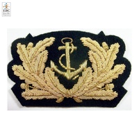 En gros OEM Écussons, insignes et emblèmes romains brodés à la main en fils d'argent, à motif flamme, à coudre sur chapeau, en feutre non tissé, sans nickel