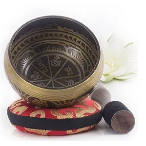 brass tibetan singing bowls traditional use for meditation to healing and relaxing body and mind with om etching on black color