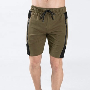 กางเกงกีฬาขาสั้นผู้ชาย ผ้าฟลีซ ซับเหงื่อ แห้งเร็ว ยืดหยุ่น ระบายอากาศได้ดี ผ้ายืดผสมคอตตอน/สแปนเด็กซ์ มีเชือกผูกเอว สำหรับวิ่ง - Product Image 1