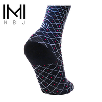 Chaussettes de basketball montantes à compression motif patchwork en Spandex/Nylon avec logo personnalisé pour l'automne – Vente en gros