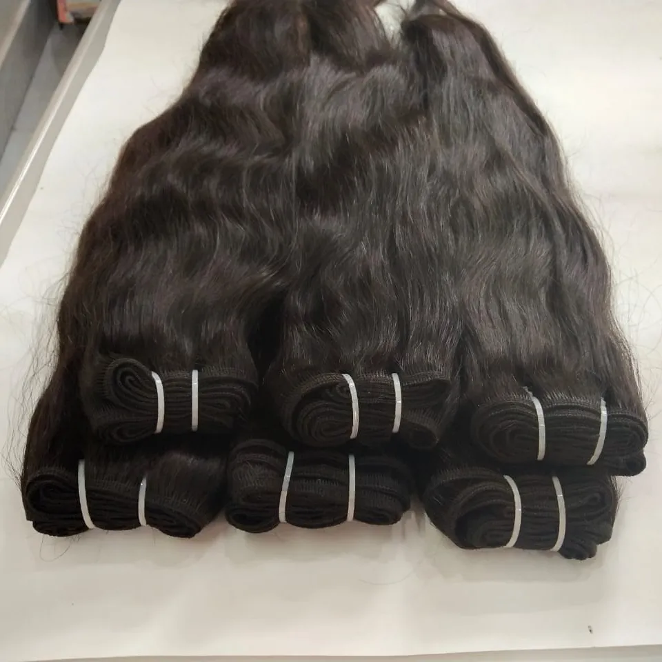 wholesale suppliers of Double Wefted Single Drawn Raw Virgin hair extension human hair clip in hair directly from india