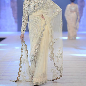 Saree de créateur lourd élégant pour femmes avec travail à la main avec des perles de verre et des pierres pour les mariages, les réceptions et les événements - Product Image 1