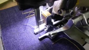 Sistema de Coser Ojales Computarizado JUKIS MEB-3900 USADO para Jeans y Pantalones de Algodón - Product Image 5