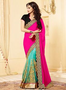 Les plus belles tenues de fête Saree en filet à broderie lourde avec chemisier Vêtements pour femmes indiennes Vente en gros à bas prix Surat ApparelGarment - Product Image 2