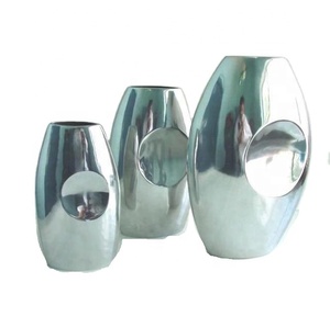 Jarrón de Flores de Aluminio Fundido con Centro Cóncavo Redondo y Acabado Pulido Espejo, También Disponible en Acabado Mate, Decoración del Hogar - Product Image 1