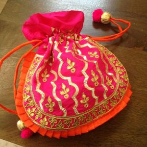 ---ELEGANT---POTLI--BAGS WITH--ELEGANT-EMBELLISHED WITH ZARDOZI FOR WORK-PARTY & <b>WEDDING</b>---2021. - Product Image 1