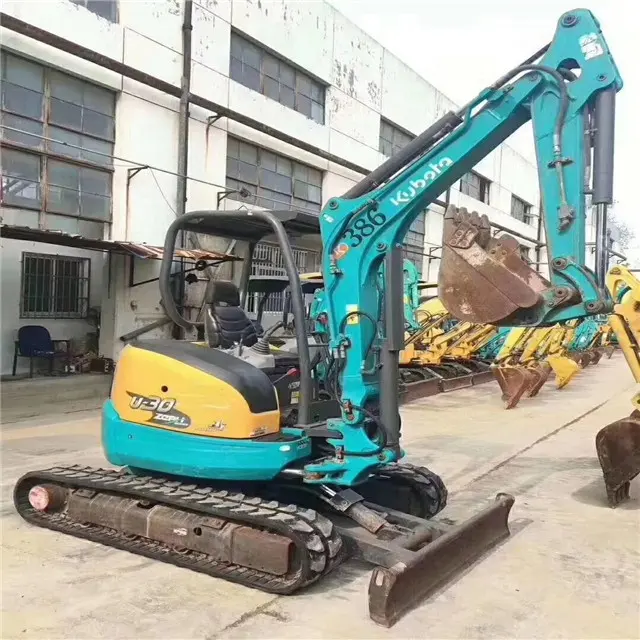 Wholesale in low price Kubota U-30 3ton mini used excavator for sale with small digger/open Cabin/blade/rubber belt track