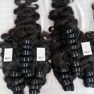 Pelo virgen de trama de máquina brasileña al por mayor, mechones ondulados rectos brasileños con cierre de encaje 4x4 pelo natural sin procesar - Product Image 1