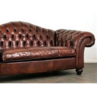Sofá Chesterfield de 3 Plazas en Cuero Genuino |   Diseño capitoné vintage de estilo europeo |   Patas de Madera Rellenas de Espuma |   Salón Akku Art