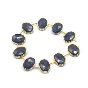 Black <b>Onyx</b> Oval Shape Silver Bezel Gold Plated Center Drilled 10 Beads Strand - Product Image 1