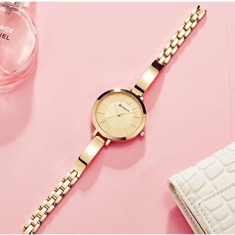 CURREN-reloj de cuarzo de diseño creativo para mujer, pulsera de moda informal, elegante, regalo Vintage, nuevo de 9012