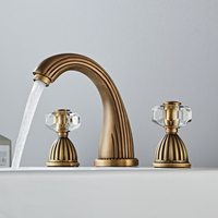 Robinet de lavabo STOCCO de luxe, design français, finition dorée, à 3 trous, montage sur plan, avec cartouche en céramique et poignées en cristal