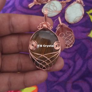 Colgante con forma ovalada de ojo de tigre, colgante envuelto en alambre, de la mejor calidad, de cristal F S, venta al por mayor - Product Image 1