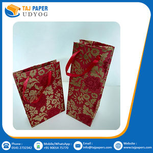 Sacs à main en carton à poignée torsadée de la meilleure qualité en papier kraft avec impression de logo personnalisé, sacs à provisions faits à la main à imprimé floral doré - Product Image 4