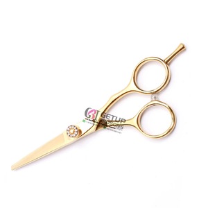 กรรไกรตัดผมคุณภาพสูง ดีไซน์หรูหรา ชุบทอง ผลิตจากสแตนเลส ด้ามจับยาง สำหรับคนถนัดขวา GETUP BROSONS - Product Image 1