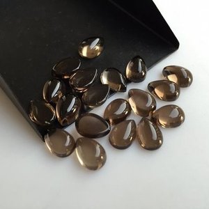 8mm 10mm cuarzo ahumado Natural pera Lisa suelta semipreciosa calibrada cabujones piedra preciosa precio al por mayor en línea Alibaba India - Product Image 1