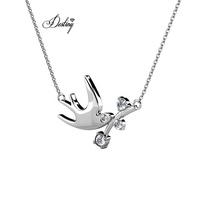Pendentif oiseau colombe flambée Daisini orné de cristaux Swarovski Collier plaqué or blanc 18 carats de haute qualité