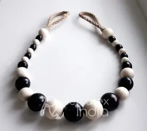 Embrasses de rideaux de perles en bois noir et blanc, fournisseur et fabrication en vrac par réfractex fabriqué en inde pour la meilleure qualité