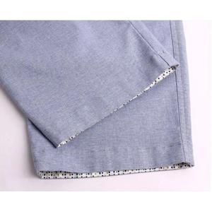 กางเกงขาสั้นลำลองผู้ชายฤดูร้อนสีทึบเอวยางยืดมีเชือกรูดขนาดพิเศษระบายอากาศป้องกันการเกิดรอยยับวัสดุถักที่เป็นมิตรกับสิ่งแวดล้อม - Product Image 6