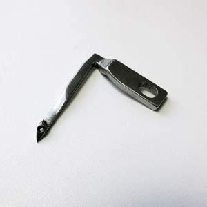 # Pièce de machine à coudre en acier Marrit Brand Lower Looper X77774-001, 0,05 kg, fabriqué à Taïwan pour Brother Viking et usage domestique - Product Image 1