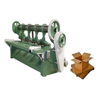 Machine à fente angulaire en carton ondulé, pour la fabrication de boîtes en carton