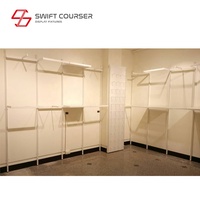 SWIFT COURSER Porte-vêtements mural en métal thermolaqué de style antique, en forme de L, avec étagères de présentation, pour magasin