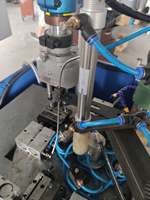 Machine de perçage et de taraudage automatique à table rotative à quatre stations pour poignée de porte