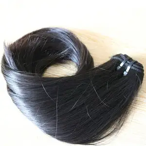 人毛エクステンションを加工することなく、ベトナムの横糸で自然な大量の毛源毛を保証