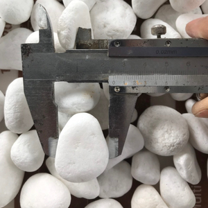 Pierre naturelle ronde polie blanc neige, écologique, design moderne, 20 lb pour la décoration paysagère extérieure - Product Image 1