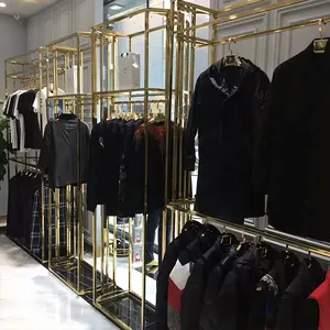 Gold Stainless Steel Landing Medium Island Shelf Factory Wholesale Price Display Stand For Clothing Shop Dress Display Rack