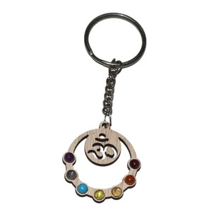 Llavero de cristal Om con chakra, metal de cobre e impresión de 2 colores |   Venta al por mayor - Product Image 1