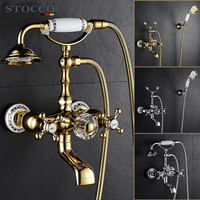 Robinet de baignoire mural de luxe STOCCO French Regency en laiton doré, mitigeur de douche orné avec poignées en cristal, idéal pour villas et hôtels