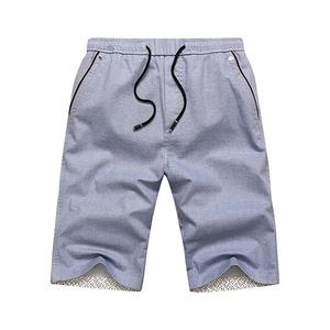 กางเกงขาสั้นลำลองผู้ชายฤดูร้อนสีทึบเอวยางยืดมีเชือกรูดขนาดพิเศษระบายอากาศป้องกันการเกิดรอยยับวัสดุถักที่เป็นมิตรกับสิ่งแวดล้อม - Product Image 1