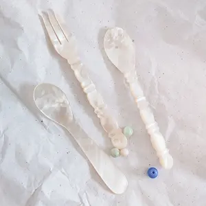 Madre di perla cucchiaio, folk, shell coltello cucchiaio forchetta piatto che serve caviale