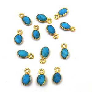 Colgante con forma pequeña ovalada turquesa, 4x6mm, oro, bisel Vermeil - Product Image 4